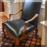 F19. French Regency armchair. Walnut with green leather and nailhead trim. 42”h x 28.5”w x 26”d 